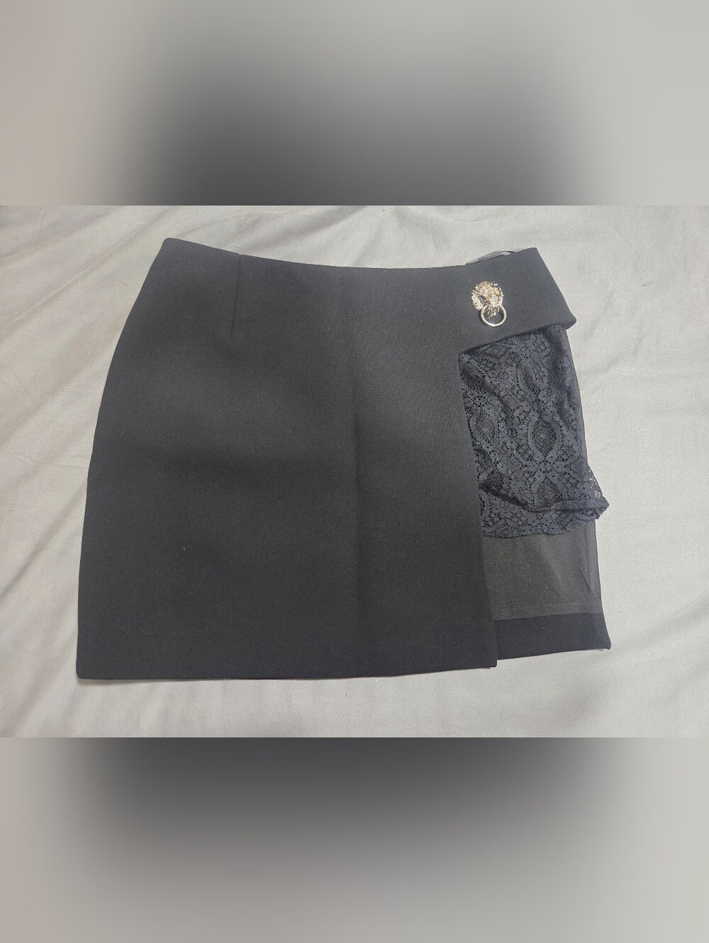 Black Lace-Accent Mini Skirt with Decorative Hardware - Women